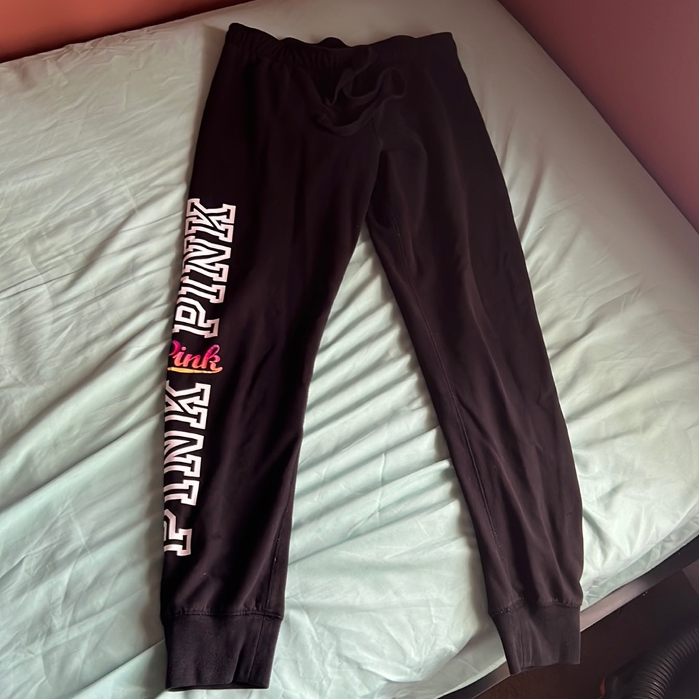 Pink branded black sweatpants